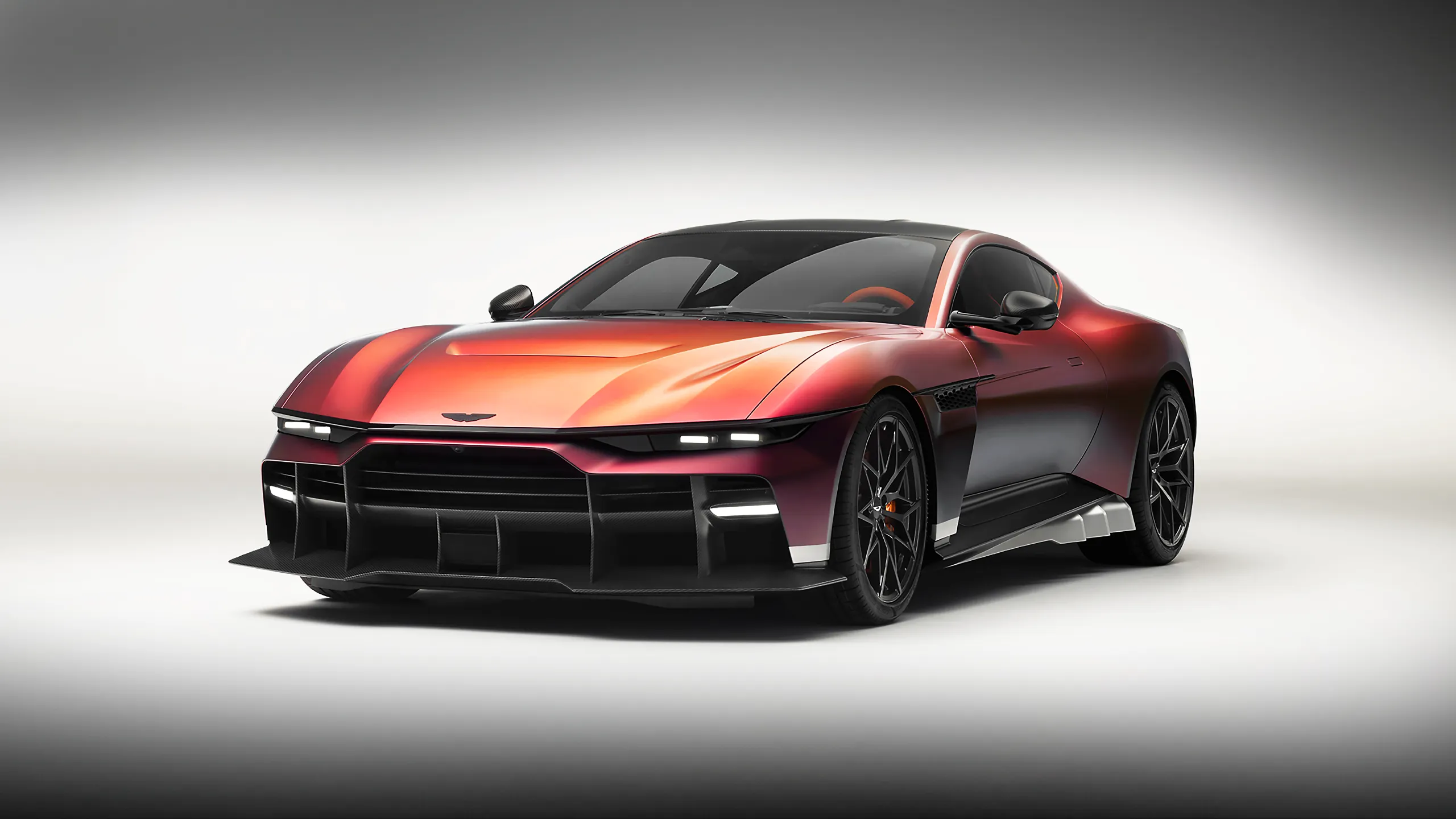 Aston Martin Valen de motor delantero y capó largo en acabado rojo satinado